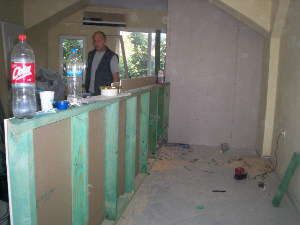 Behind bar 1 photo